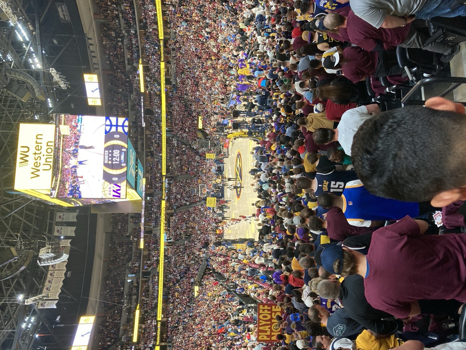 A packed, sold-out basketball arena in Cleveland during an NBA playoff game.